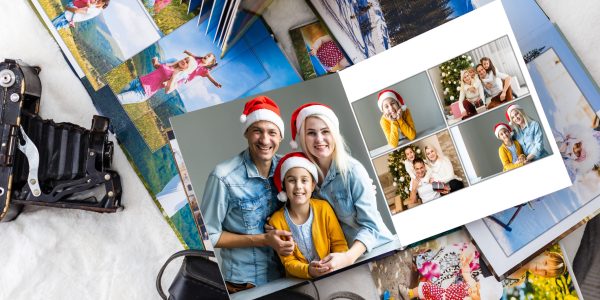 Photo collage of nine images with winter concept. Holiday season. open photo book with christmas photos.